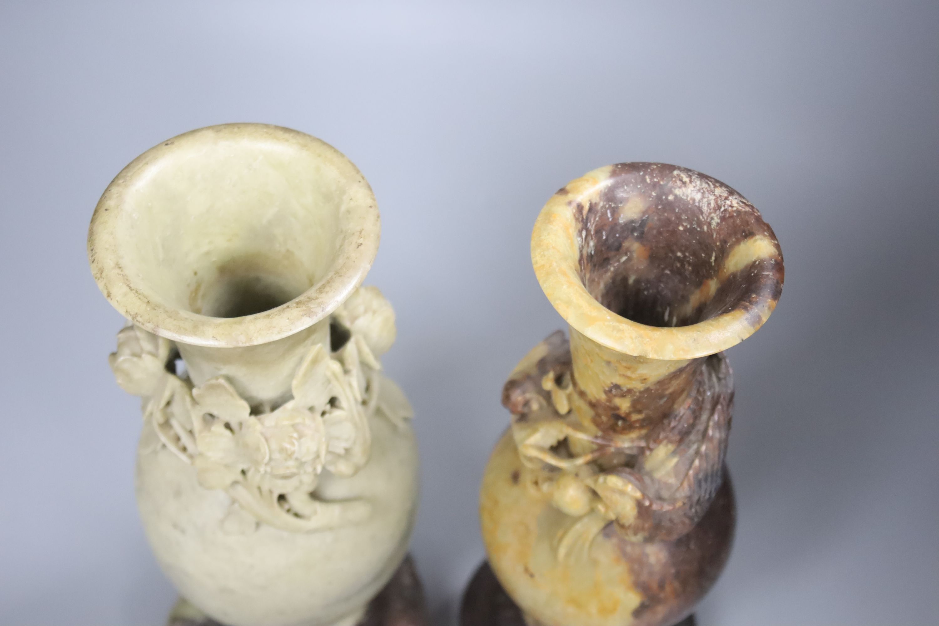 Two early 20th century Chinese soapstone vases, tallest 31cm